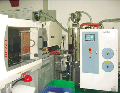 Auxiliary machines for plastic processing